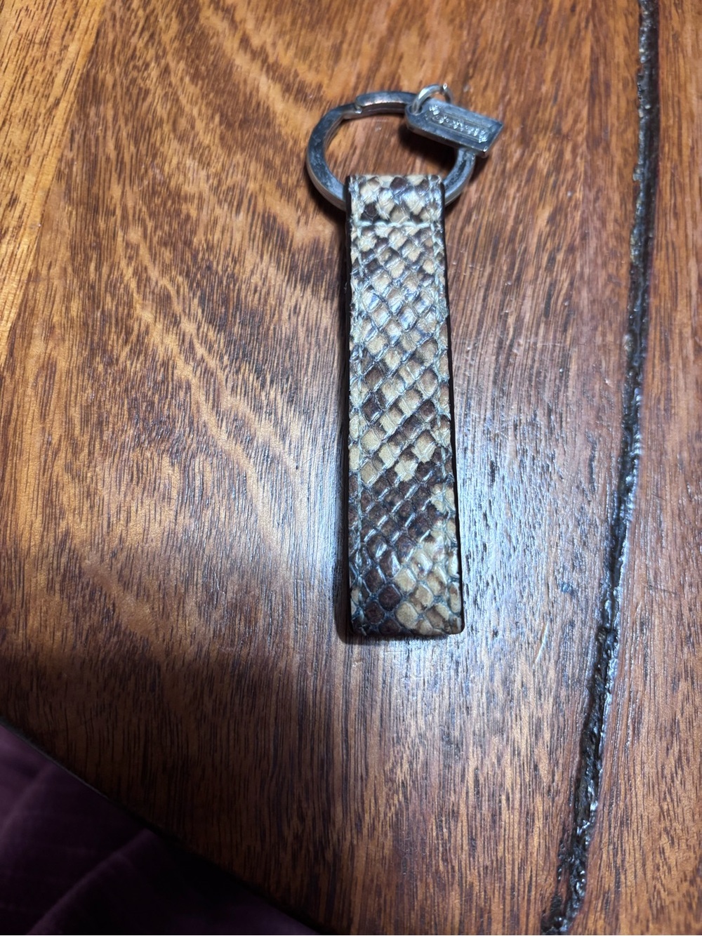 Coach brown snakeskin pattern keychain